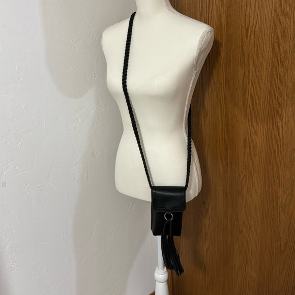 Dress Barn black vegan leather braided crossbody w/ tassels - Picture 2 of 11